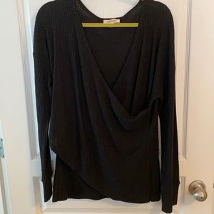 Black v-neck thermal long sleeve top. Size large.